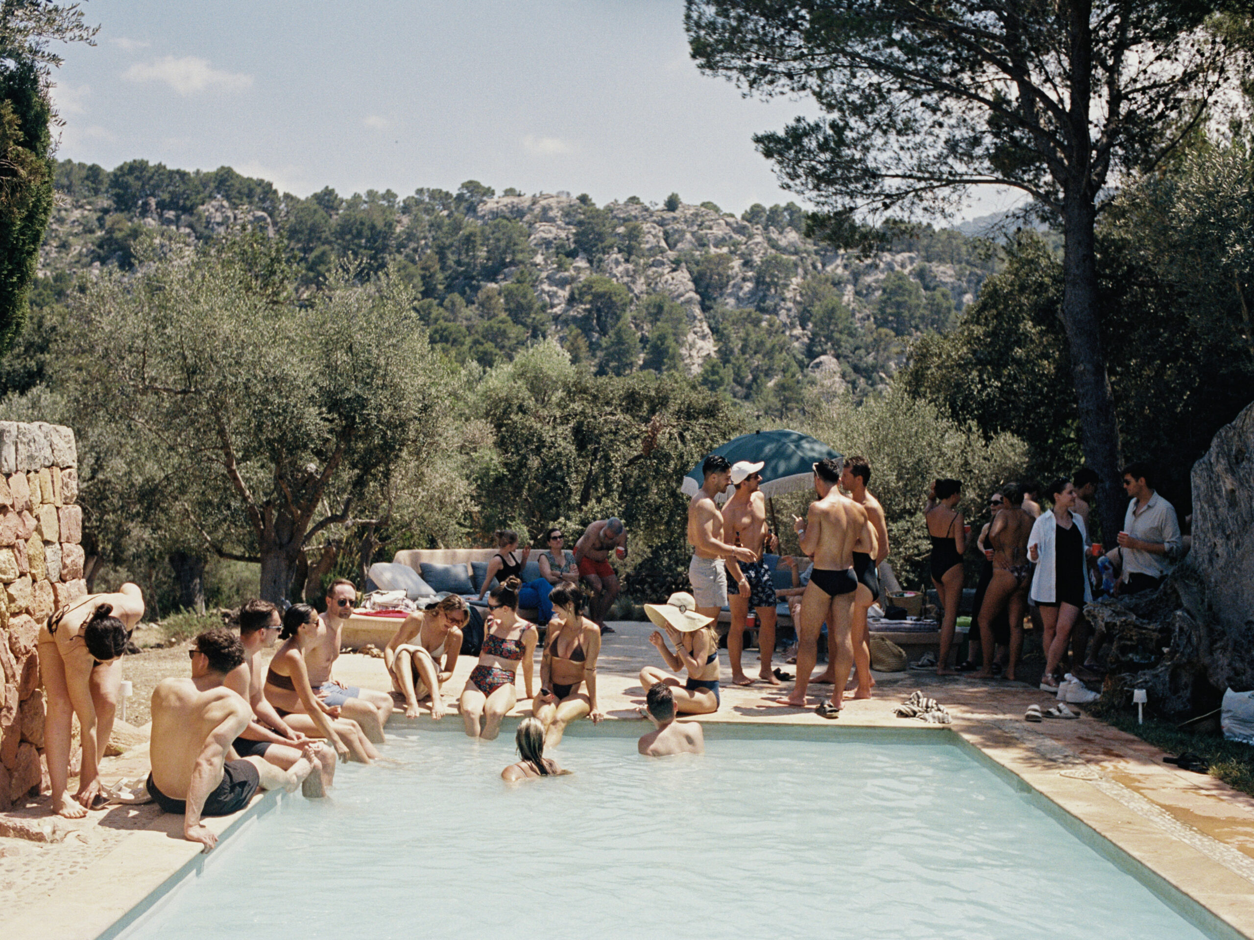 Slim Aarons Pool party in spain